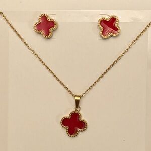 Four leaf clover necklace and earrings set in stainless steel.